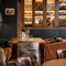 A table in the restaurant of the Three Horse Shoes.