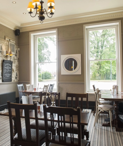 Internal seating area in a pub restaurant