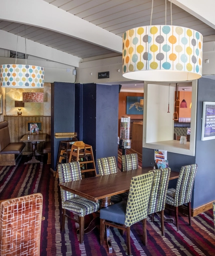 Interior dining area of a pub.