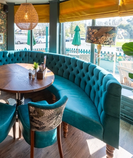 Interior seating and restaurant area of the Buff