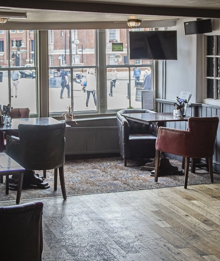 The interior restaurant seating area at The Bull.