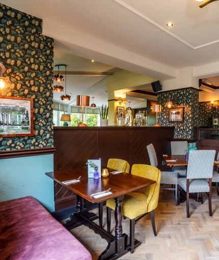 The interior restaurant seating area at The Two Greens.