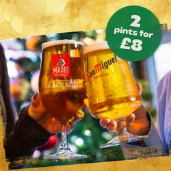 A graphic banner promoting 'Two pints for Eight Pound' at Flaming Grill venues.