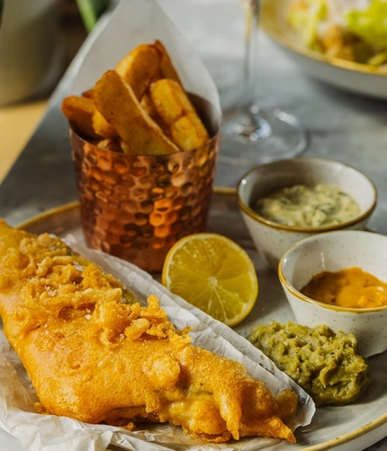 A fish & chips dish served at Crafted Venues.
