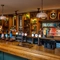 The interior bar area with hanging pendant lighting at The Church View Inn.