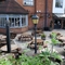 Exterior beer garden of a pub with a seating area.