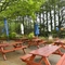 Exterior beer garden of a pub with a seating area.