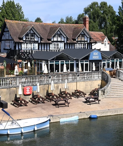An aerial view of the Boat House, and the river running next to it.