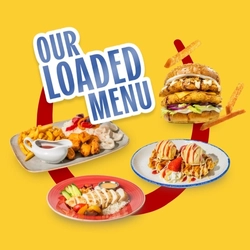Promotional graphic reading “Our Loaded Menu” surrounded by menu items including loaded chips with chicken and sauces, a stacked chicken burger, sliced chicken with rice and salad, and waffle desserts topped with ice cream and strawberry sauce, on a yellow background with a red horseshoe graphic.