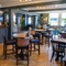 The interior bar and restaurant seating area at The Hare & Hounds.