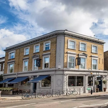 External image from across the street with blue sky and clouds.