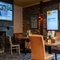 The interior restaurant and seating area with TV at the Man of Gwent.
