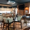 The restaurant area of the Cocked Hat, with a TV on the wall.
