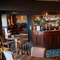 Interior of the restaurant showing a seating area and bar