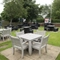 Exterior beer garden of a pub with a seating area.