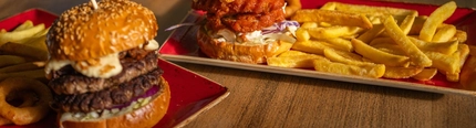 A served selection of burgers  available on the Hungry Horse Autumn Winter menu.