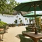 The exterior facade and beer garden seating area at The Fox & Hounds in Wimborne.