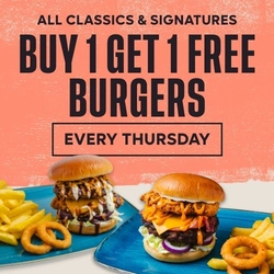 A graphic banner promoting buy one get one free burgers at Flaming Grill venues 'All classics and signatures buy 1 get 1 free burgers, every Thursday.'