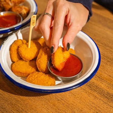 A served side of Impossible Nuggets being enjoyed by customers available at Hungry Horse venues.