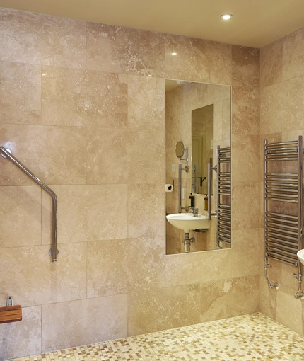 The interior ensuite bathroom with shower to one of the hotel rooms at The Fox.