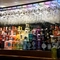 Spirits bottles behind bar