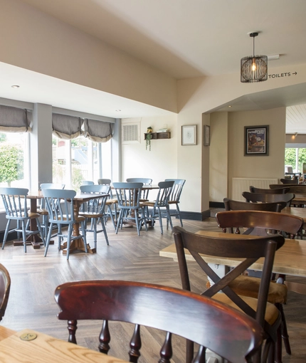 Interior dining area of a pub.