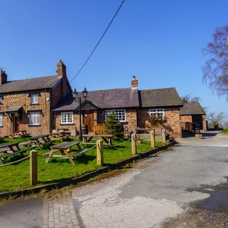 Exterior shot of the pubs facade and beer garden