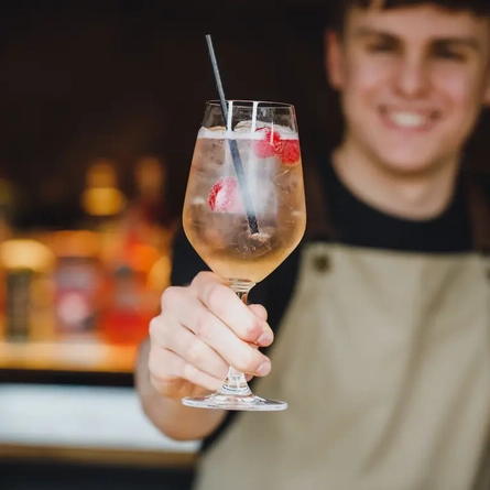 Bartender serving a drink