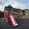 exterior beer garden of a pub with a seating area and a play area