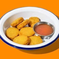 A packshot featuring a bowled Impossible Nuggets dish available for delivery from Hungry Horse venues.