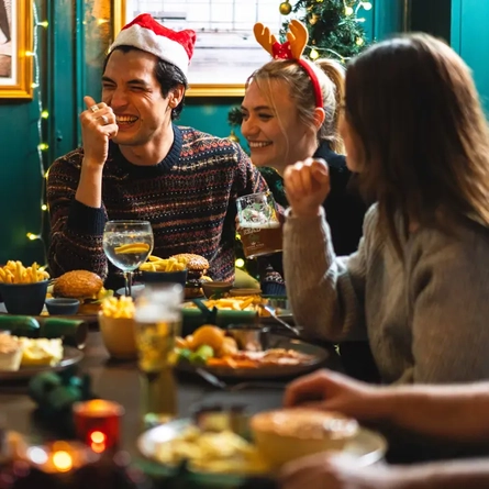 Friends enjoying a festive meal together