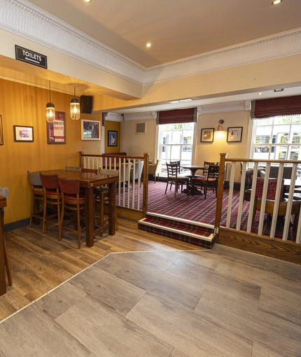 Interior dining area of a pub.