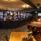 interior bar with seating area and restaurant