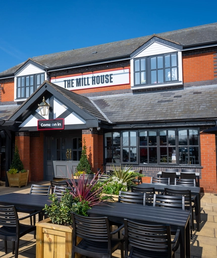 Exterior of the venue and the beer garden at the Mill House Cheshire.