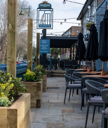 Exterior and beer garden of the Cricketers pub in Southwick