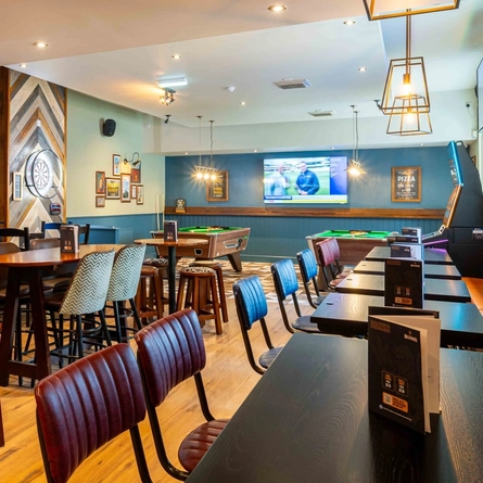 The interior restaurant and seating with TV area at the Armstrongs.