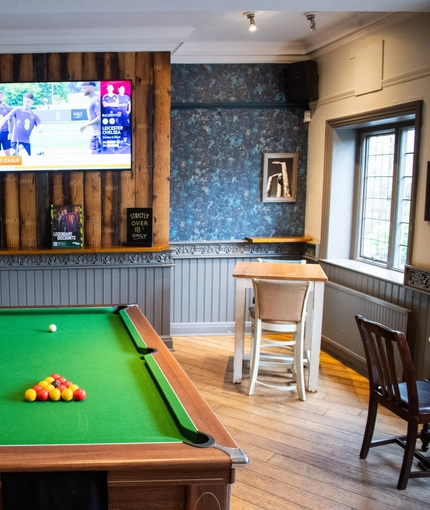 internal seating area with pool table