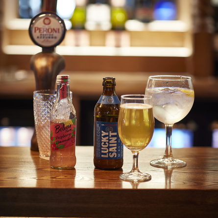 A selection of low and no alcohol drinks on a bar.