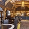 The interior restaurant and seating area with TV and bar at the Rovers Tye.