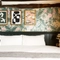 A bed in a hotel room of The Narborough Arms.