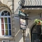 External view of a pub entrance and outdoor seating area