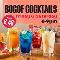 A banner displaying a variety of different cocktails available at Flaming Grill venues.