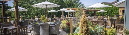 The exterior beer garden seating area at The Boathouse.