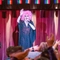 An interior image of one of the drag queen performers on the live event stage entertaining crowds during Pride Weekend at The City Of Quebec.