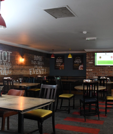 interior restaurant and seating with TV