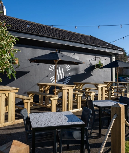 The exterior beer garden with seating area at the Lutley Oak.