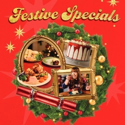 A banner showing the words "Festive Specials" in golden letters, above a Christmas wreath containing images of a red Christmas cracker, plates of Christmas dinner, a cake served on a cake stand, and a person enjoying a plate of cheesecake. The text and images sit on a red background and are surrounded by gold stars.