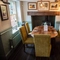 interior dining area of a pub with a fireplace