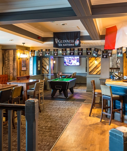 interior of the restaurant with pub games