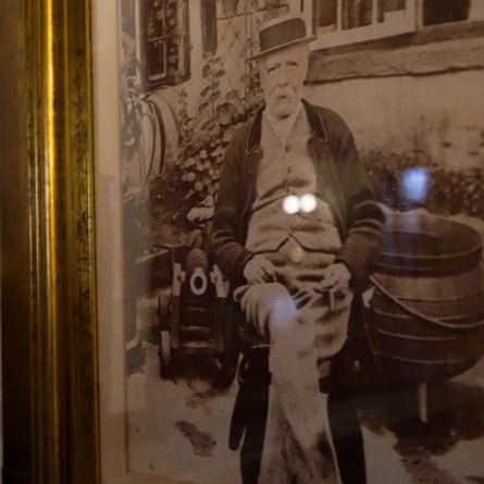 A historic photo of a man in Ye Olde Trip to Jerusalem.